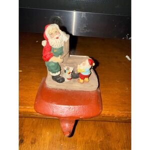 Vintage Cast Iron Santa Claus and Elf Workshop Christmas Stocking Hanger Holder